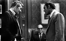 David Janssen, Ray Milland, and John Saxon