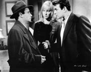 Peter Falk, May Britt, and Stuart Whitman