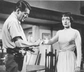 Charles McGraw and Carolyn Jones