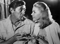 Robert Mitchum and Carroll Baker