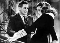 Errol Flynn and Dorothy Malone