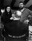 Karin Dor, Alfred Hitchcock, and John Vernon