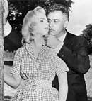 Martha Hyer and Raymond Burr