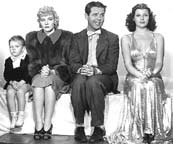 Larry Simms, Penny Singleton, Arthur Lake, and Rita Hayworth