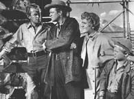 Alan Ladd, Van Heflin, Jean Arthur, and Brandon De Wilde