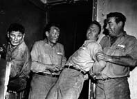 Charles Bronson, William Talman, Ralph Meeker, and Lon Chaney Jr.