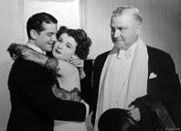 Robert Cummings, Ruth Hussey, and Nigel Bruce