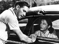 Errol Flynn and Ruth Roman