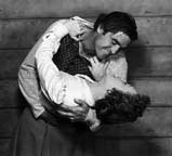 Steve Cochran and Marcia Henderson in Back to God's Country