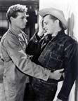 Guy Madison and Robert Mitchum