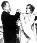 Carol Ohmart and James Gregory