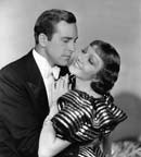 David Manners and Claudette Colbert
