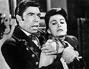 Michael Pate and Faith Domergue