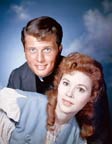 Ron Ely and Jill St. John