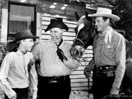 Tommy Ivo, Smiley Burnette, and Charles Starrett