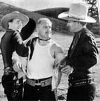 Crash Corrigan and John Wayne