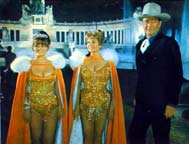 Claudia Cardinale, Rita Hayworth, and John Wayne