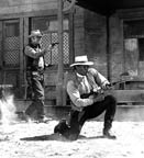 William Holden and Woody Strode